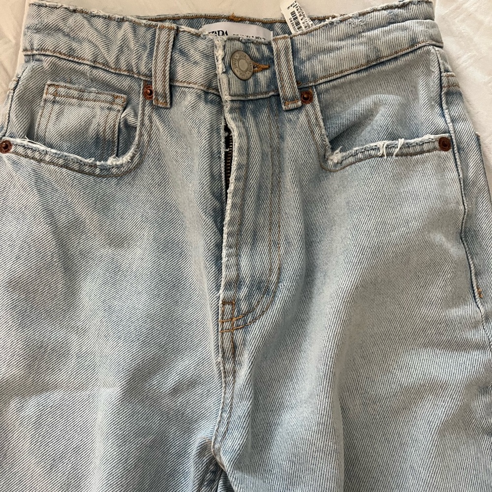 Zara jeans with knee rips. So flattering on.